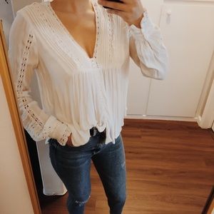 White crochet detailed free people blouse.